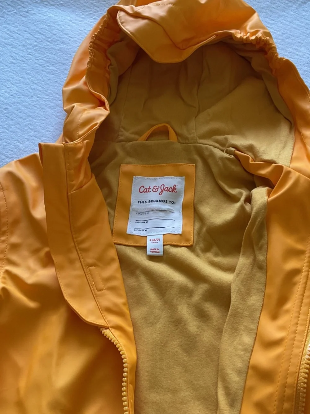 CAT & JACK Waterproof rain jacket with hood and reflective bands,
